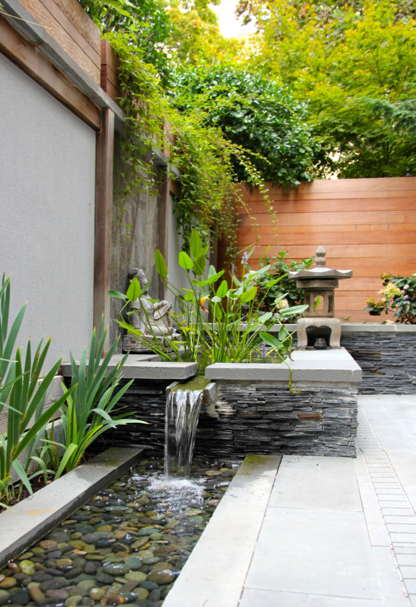 Slate water cascade with pebble basin
