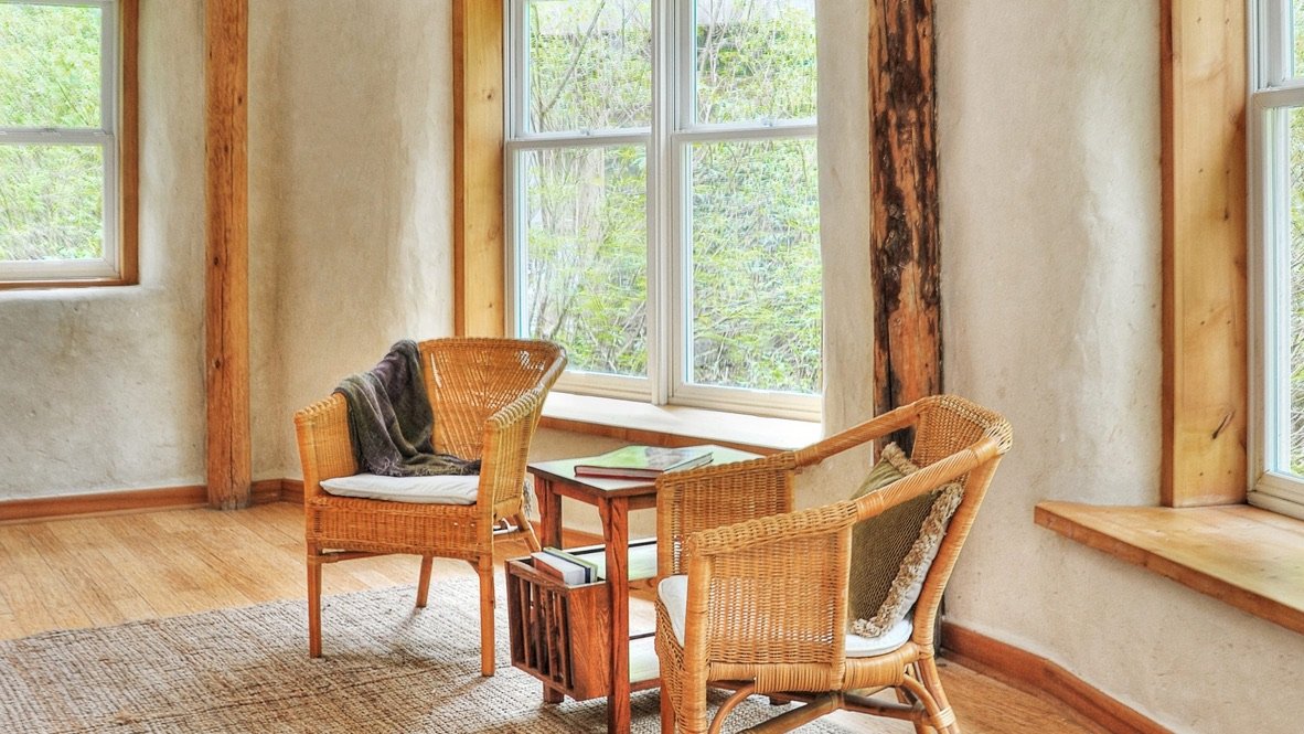 Beautifully restored interior with lime plaster walls and natural light
